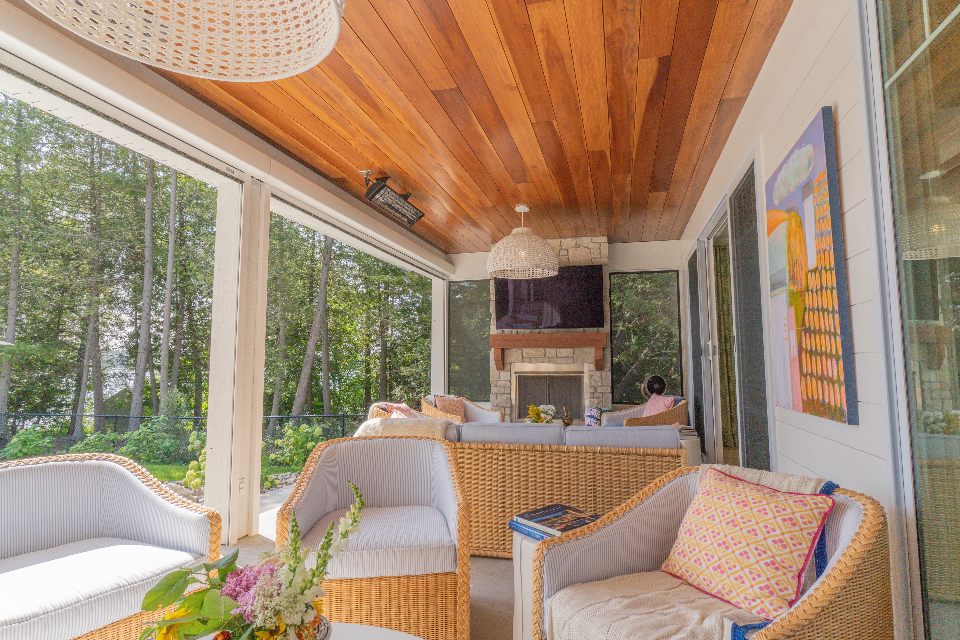 Waterside view of nautical gambrel custom home on Lake Charlevoix designed by Ver Woert Construction residential design